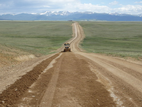 GDMBR: Playing CHICKEN with a ROAD-GRADER - This side of the road was actually smoother.